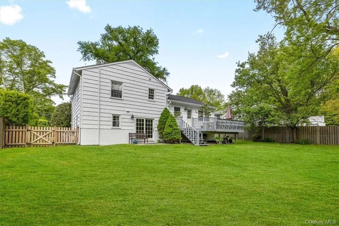Oversized deck off the kitchen- perfect for evening dinners, morning coffee in the privacy of your own back yard. Oversized deck off the kitchen- perfect for evening dinners, morning coffee in the privacy of your own back yard.