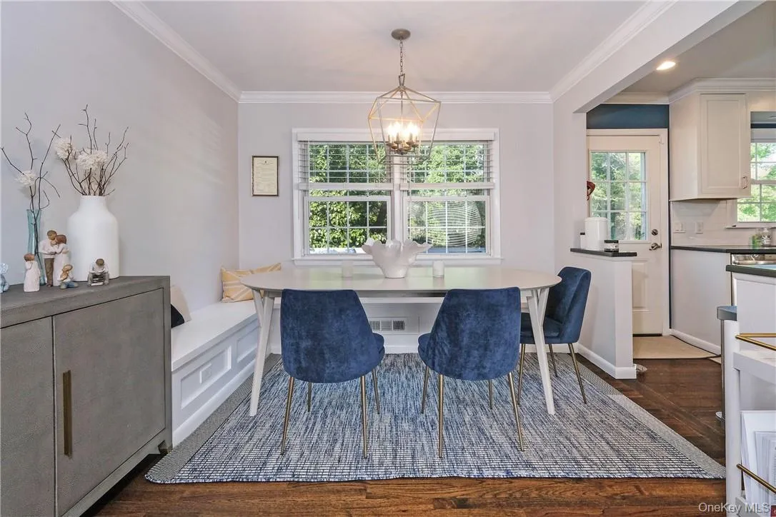 Dining area features a built-in banquette open to every day living space and kitchen. Allows for easy flow of conversation and entertaining. Dining area features a built-in banquette open to every day living space and kitchen. Allows for easy flow of conversation and entertaining.