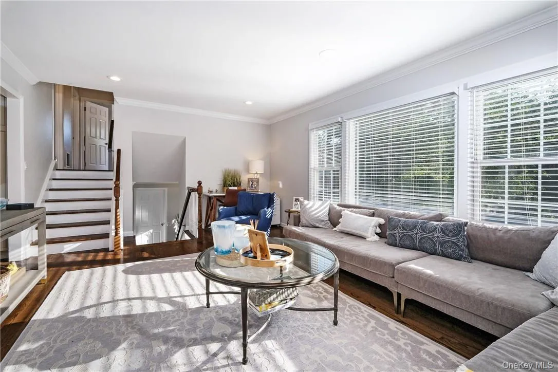 Happy sun-filled light and bright home! Open living room with tucked away desk space. Happy sun-filled light and bright home! Open living room with tucked away desk space.