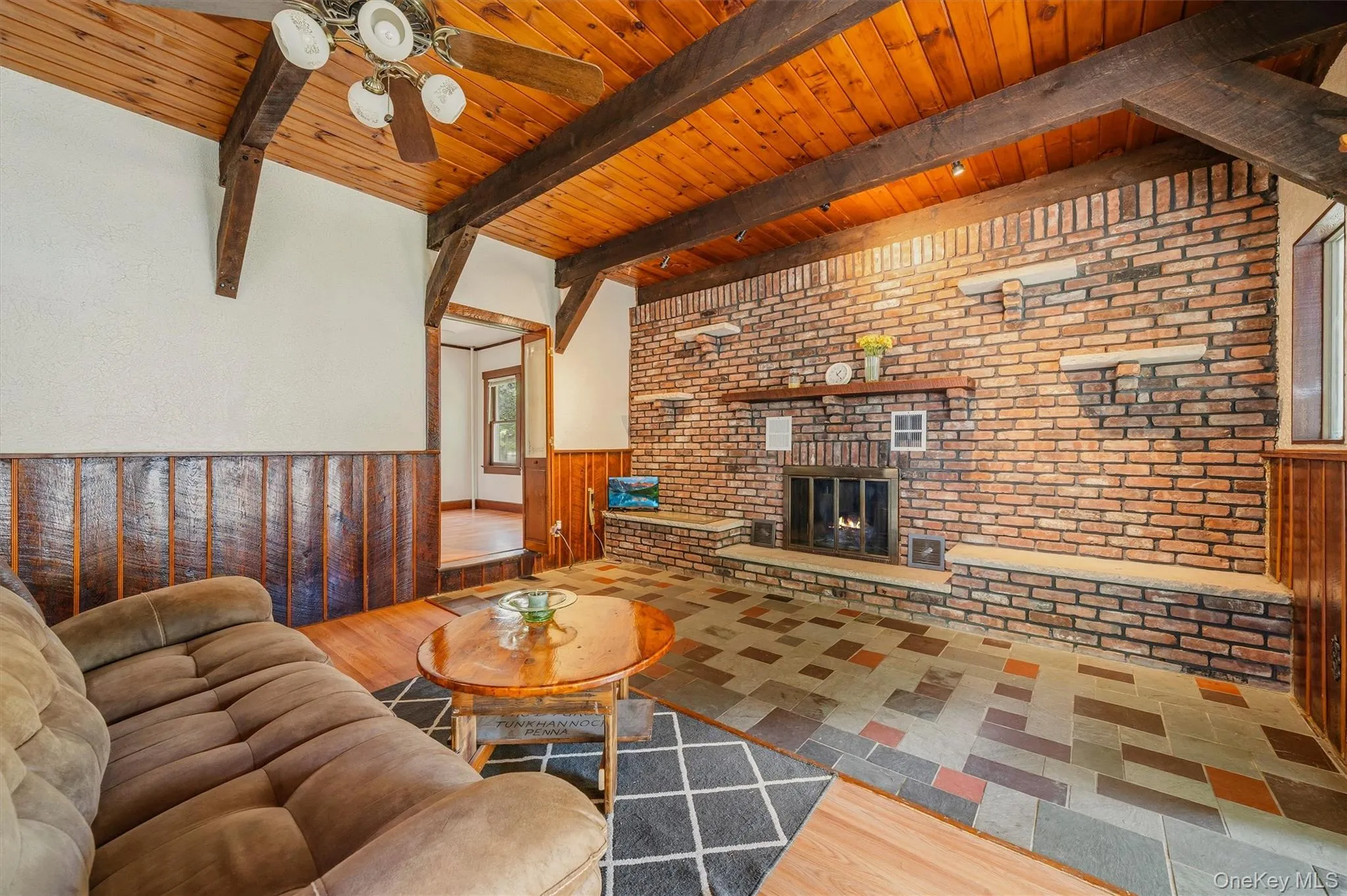 Magnificent brick fireplace w/blower for maximum warmth Magnificent brick fireplace w/blower for maximum warmth
