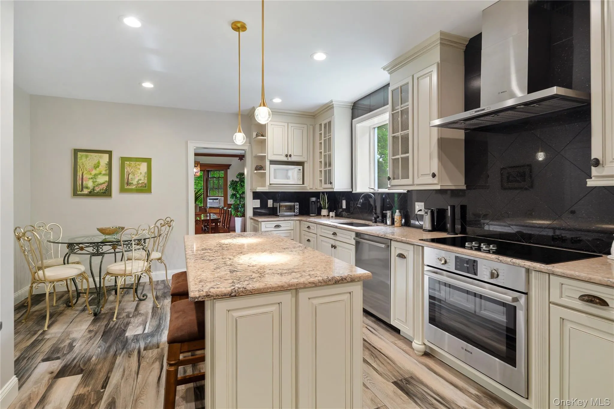 View of kitchen with door to formal dining room View of kitchen with door to formal dining room