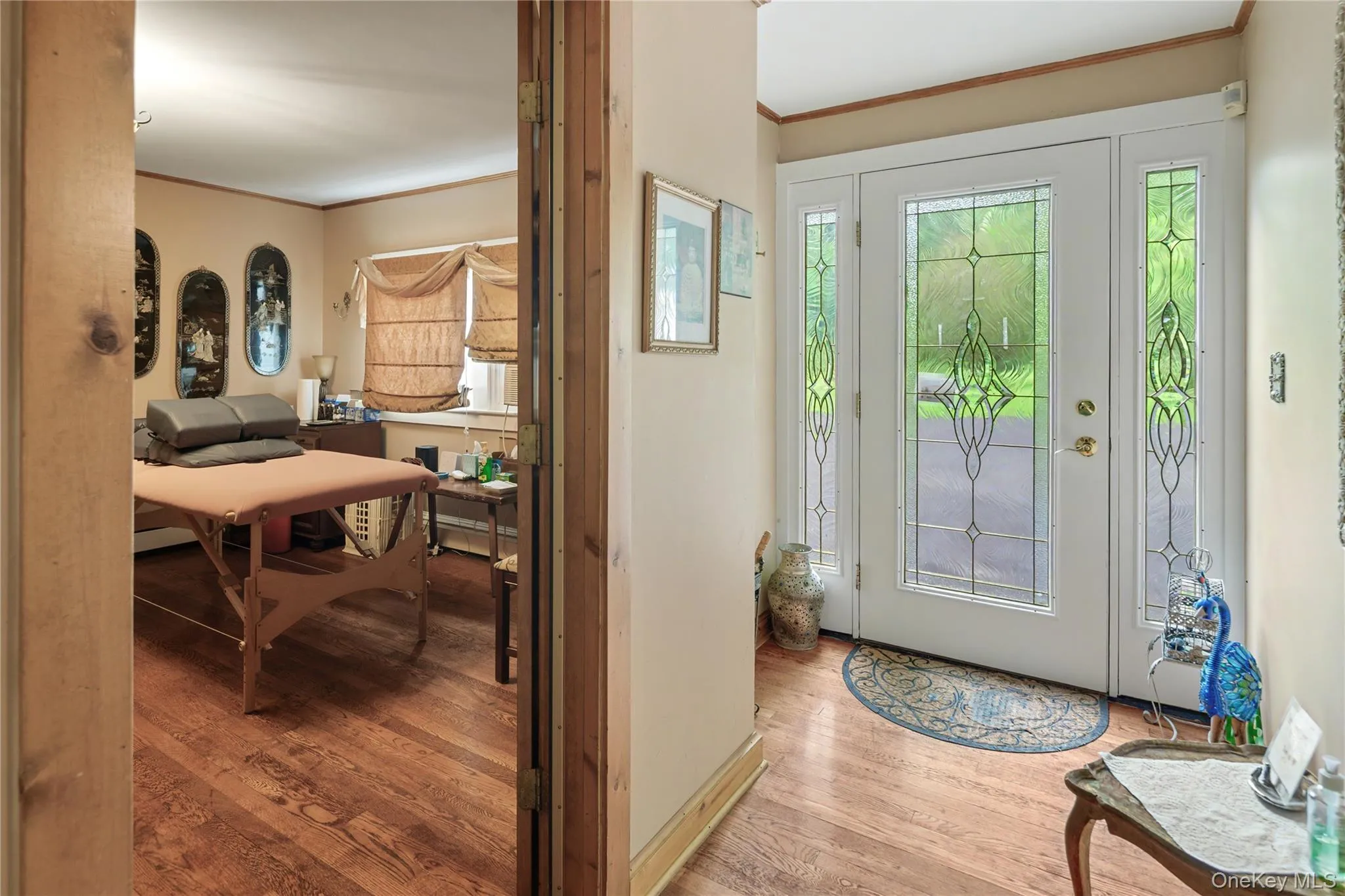 Separate entry to attached professional office suite, leaded glass door with sidelights, oak hardwood floors, consultation room on left can also double as a guest bedroom. suite consists of the entry foyer, waiting room, two consultation rooms, an office and a full bath and is also connected to the main house through the back entry foyer Separate entry to attached professional office suite, leaded glass door with sidelights, oak hardwood floors, consultation room on left can also double as a guest bedroom. suite consists of the entry foyer, waiting room, two consultation rooms, an office and a full bath and is also connected to the main house through the back entry foyer