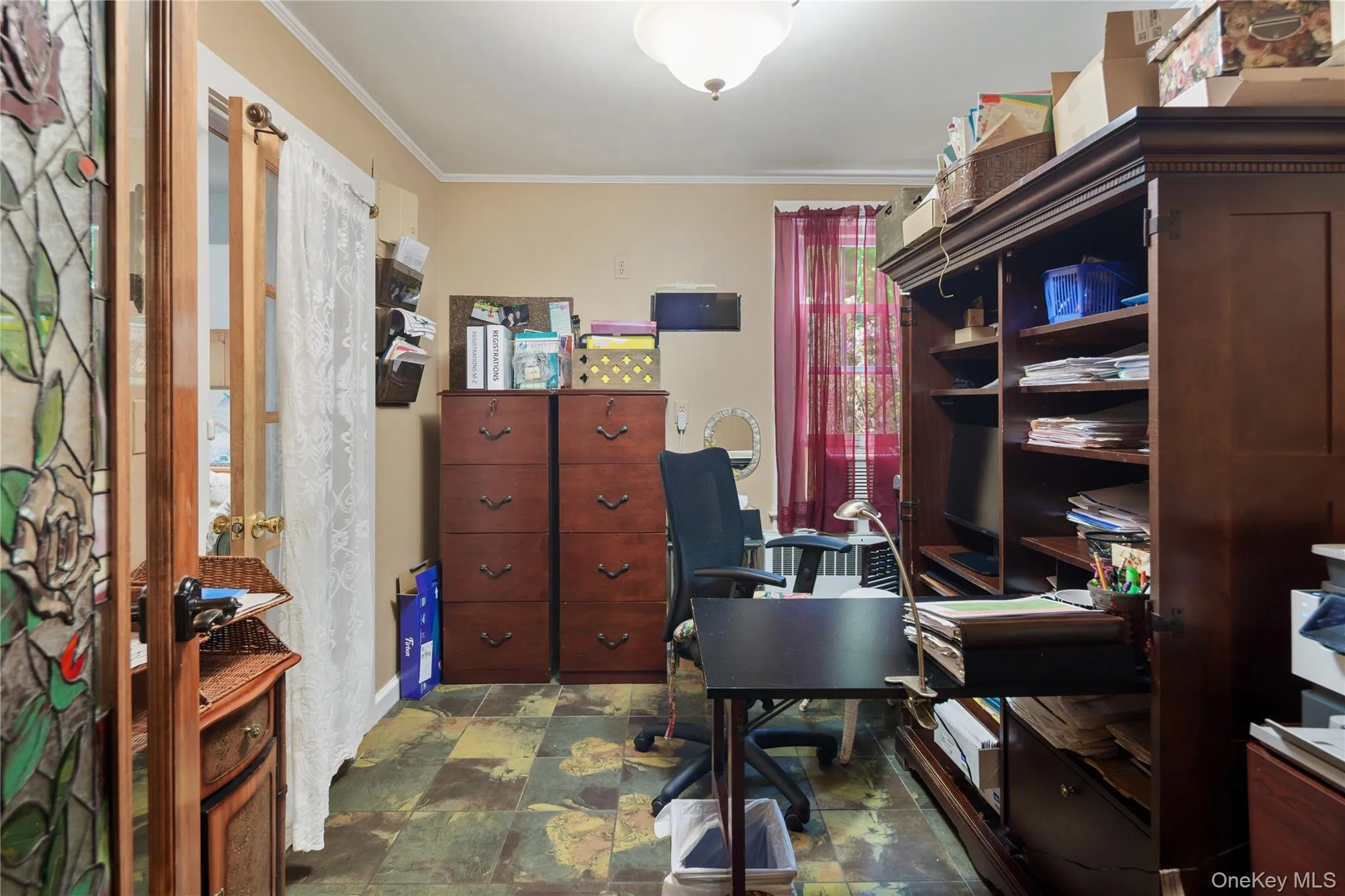 Professional office suite: office provides a transition space from main house back entry hall Professional office suite: office provides a transition space from main house back entry hall