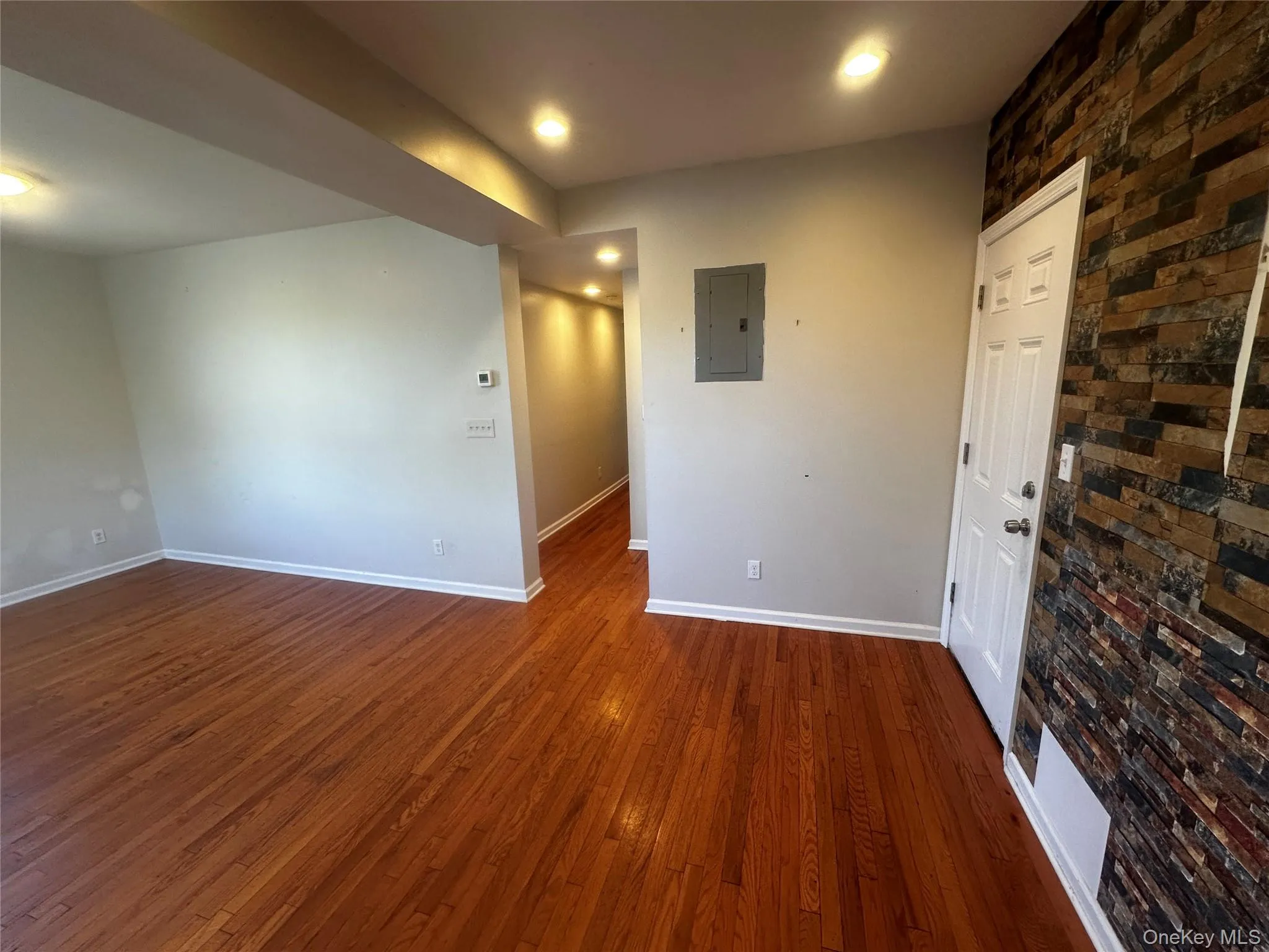 Hallway to three bedrooms. Hallway to three bedrooms.