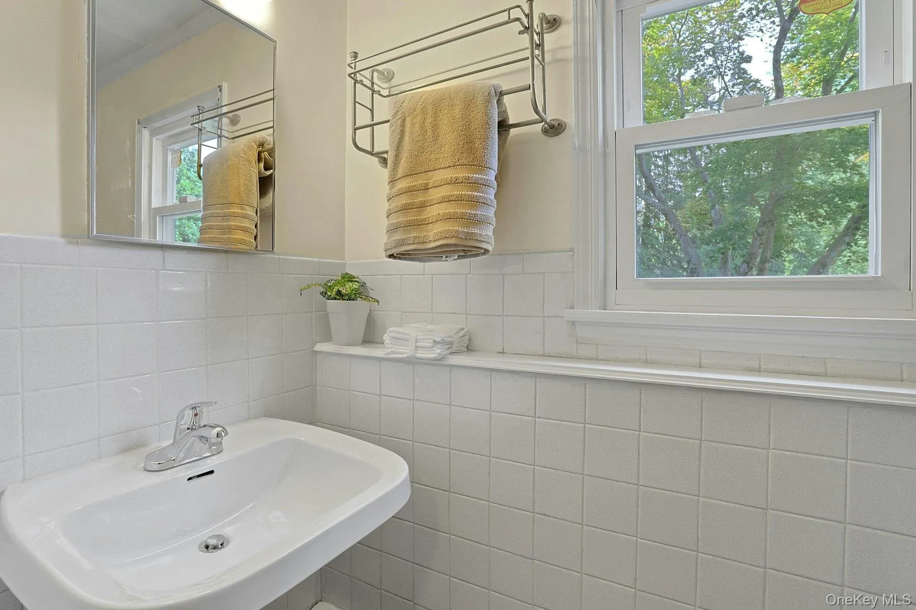 Lower level powder room. Lower level powder room.