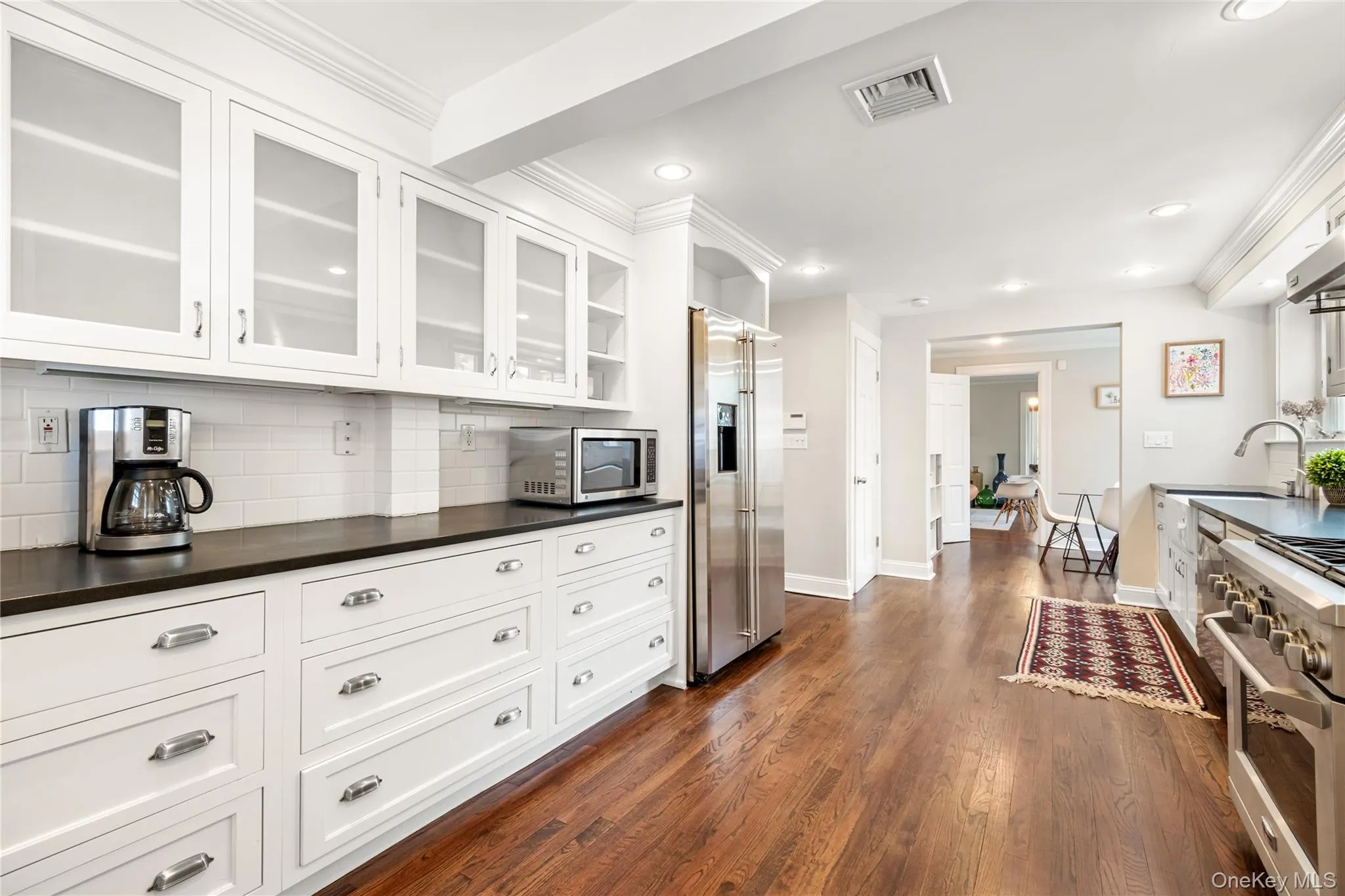 Kitchen with an abundance of custom cabinets Kitchen with an abundance of custom cabinets