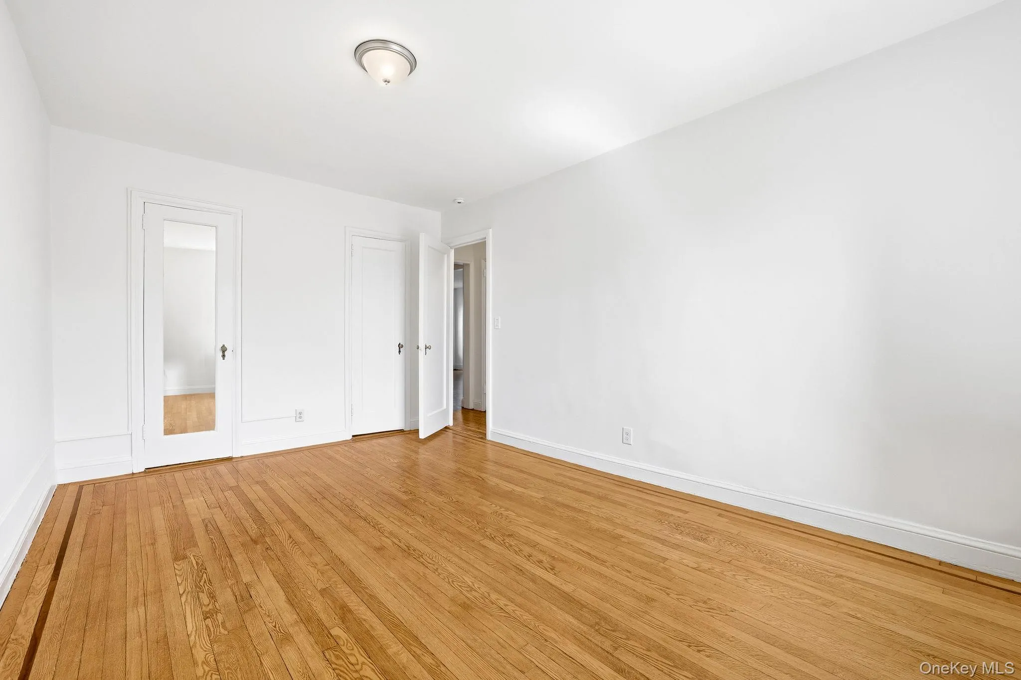 There are 2 closets in this second bedroom, and with a size similar to the other bedroom, it remains an option to be the primary bedroom There are 2 closets in this second bedroom, and with a size similar to the other bedroom, it remains an option to be the primary bedroom