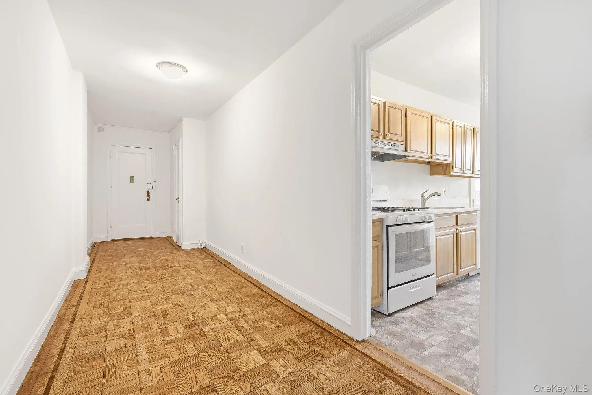 This true entry hallway with a coat closet is wide enough to accept a console table for your keys, or to set up a bookcase! This true entry hallway with a coat closet is wide enough to accept a console table for your keys, or to set up a bookcase!