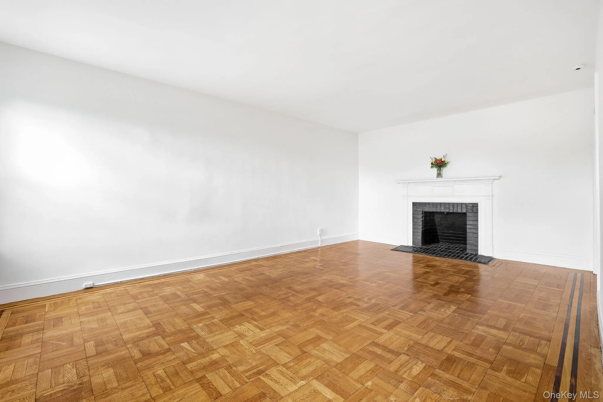This is the spacious living room, with its decorative fireplace so bring on the candles to light up the atmosphere on chilly nights This is the spacious living room, with its decorative fireplace so bring on the candles to light up the atmosphere on chilly nights