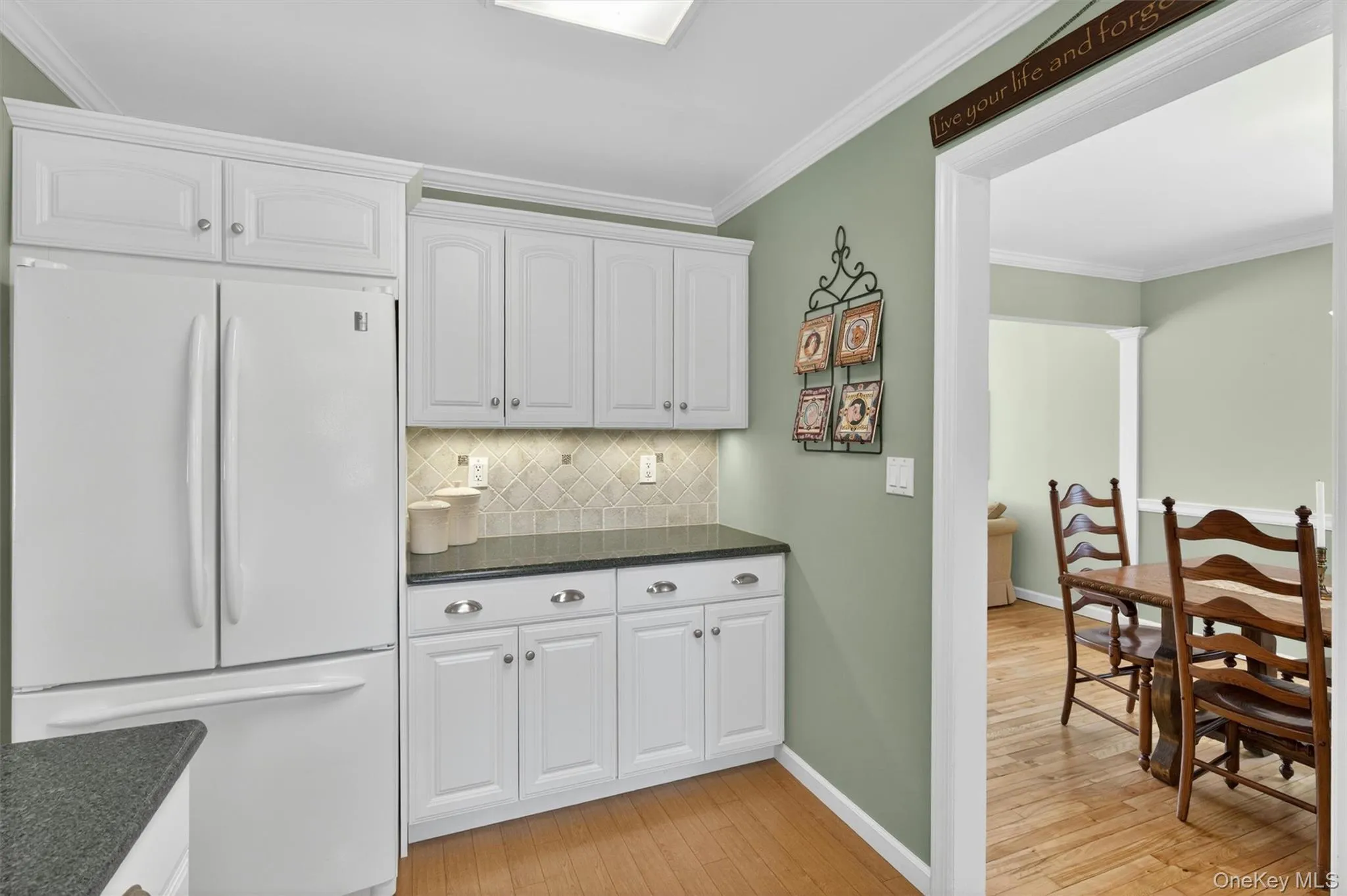 Kitchen with view into dining area Kitchen with view into dining area
