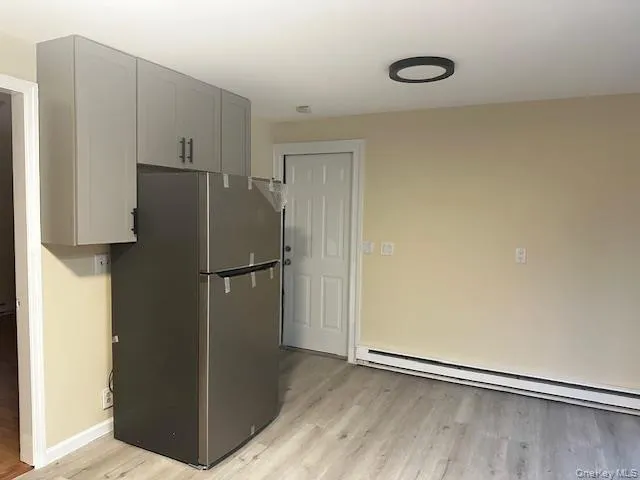 New Fridge. Door to garage off of kitchen New Fridge. Door to garage off of kitchen