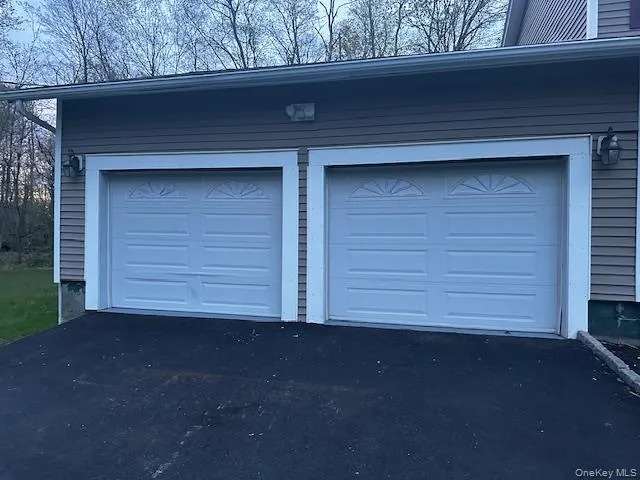 two car garage and plenty of parking on driveway two car garage and plenty of parking on driveway