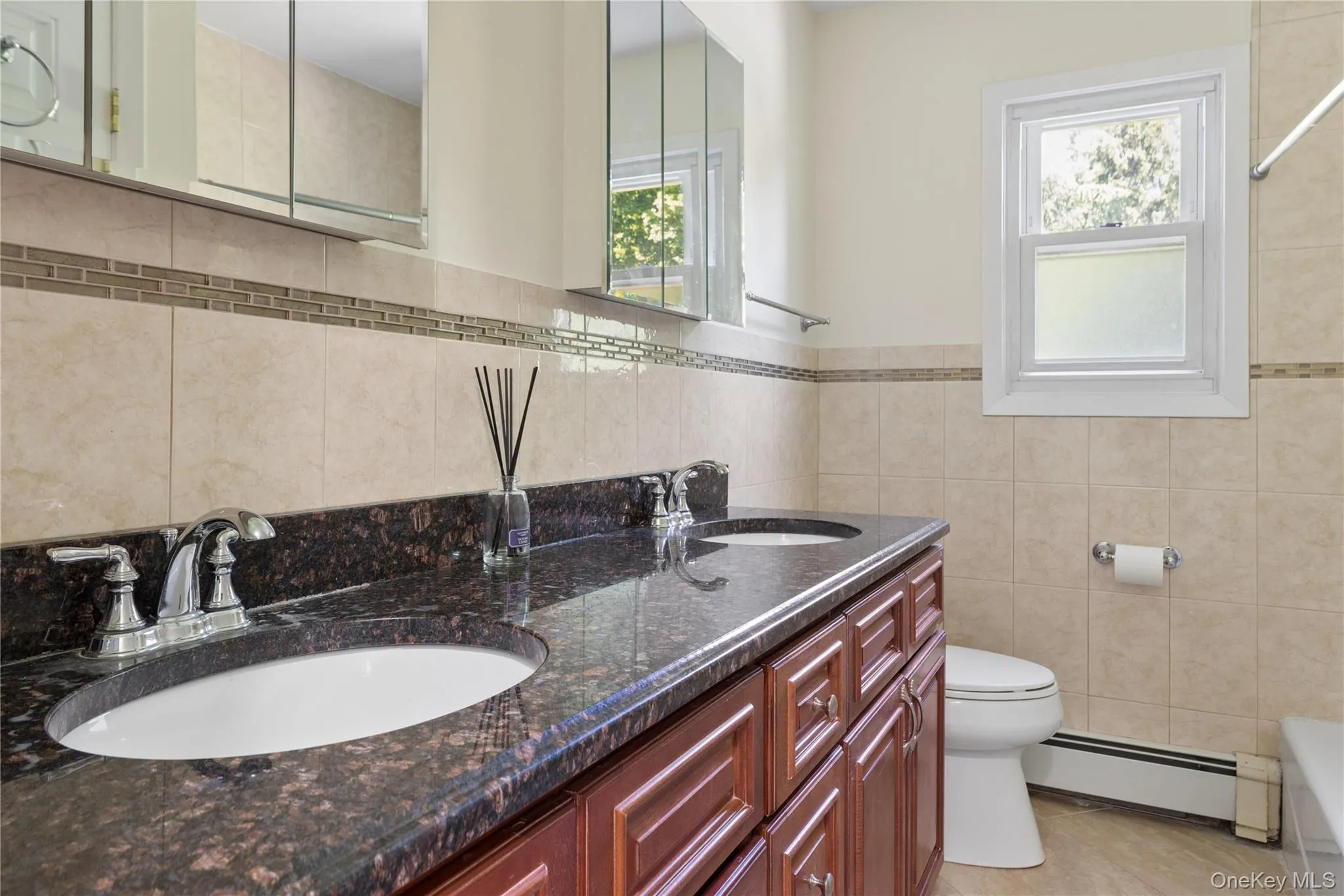 Tile floor, tub and shower. linen closet. Tile floor, tub and shower. linen closet.