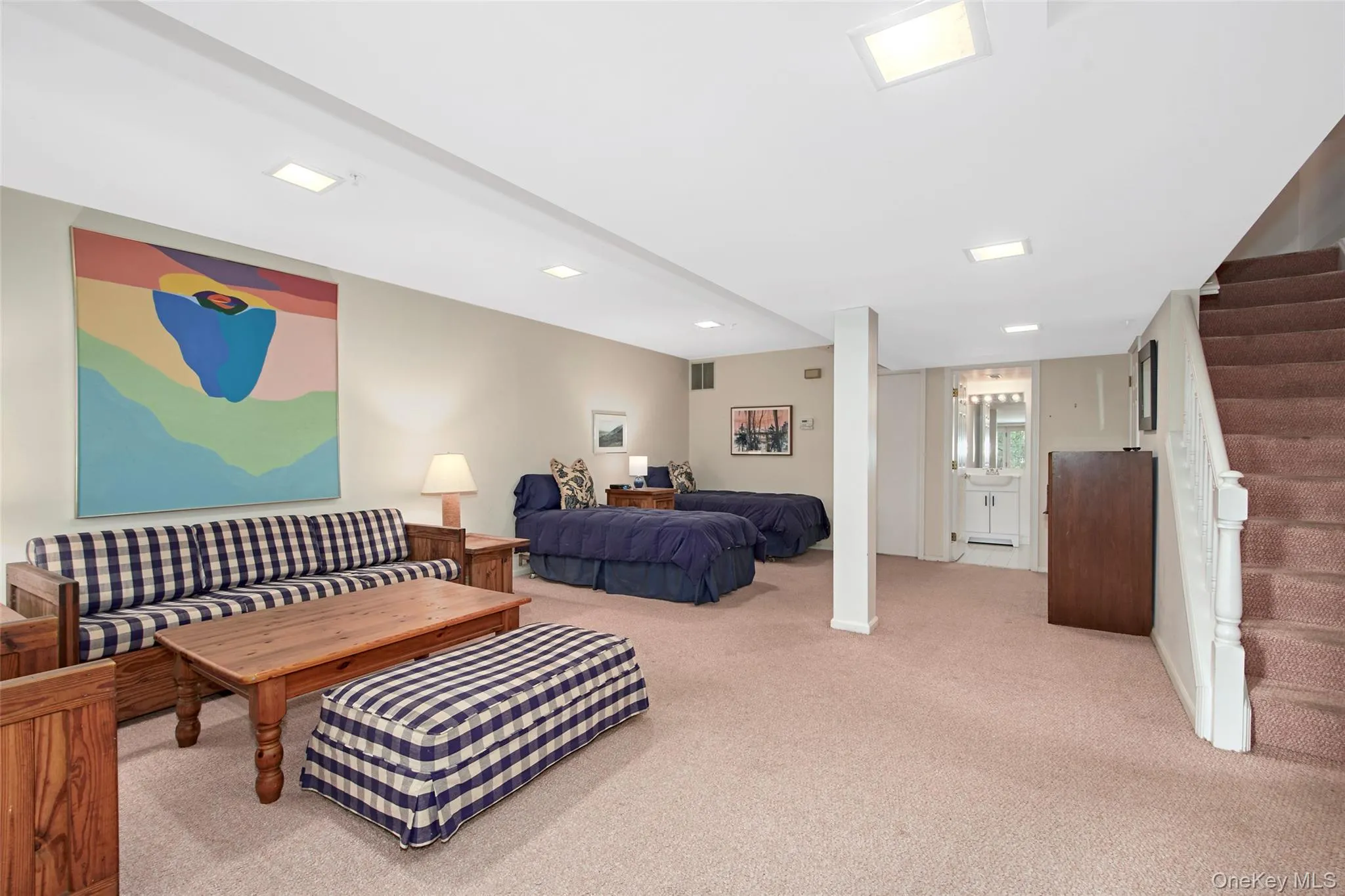 Lower level all purpose room, Sitting and Bedroom areas with door to the lower level Patio Lower level all purpose room, Sitting and Bedroom areas with door to the lower level Patio