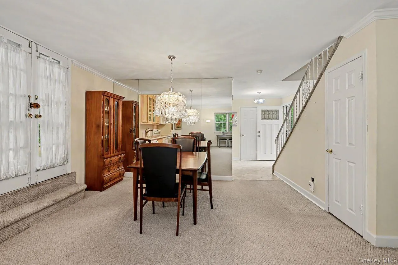 View showing storage/coat closet on right. French doors on left lead to huge patio View showing storage/coat closet on right. French doors on left lead to huge patio
