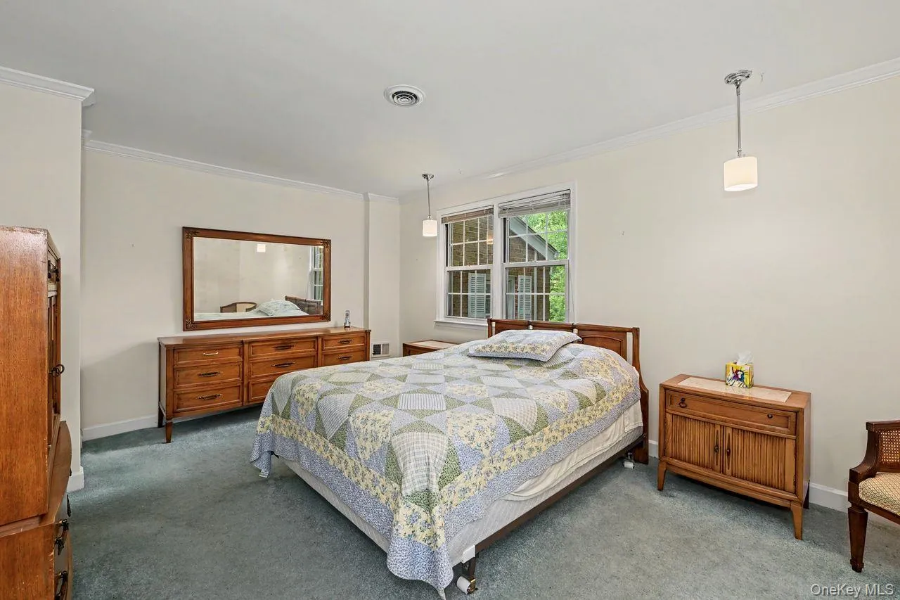 Good sized primary bedroom has 3 closets Good sized primary bedroom has 3 closets