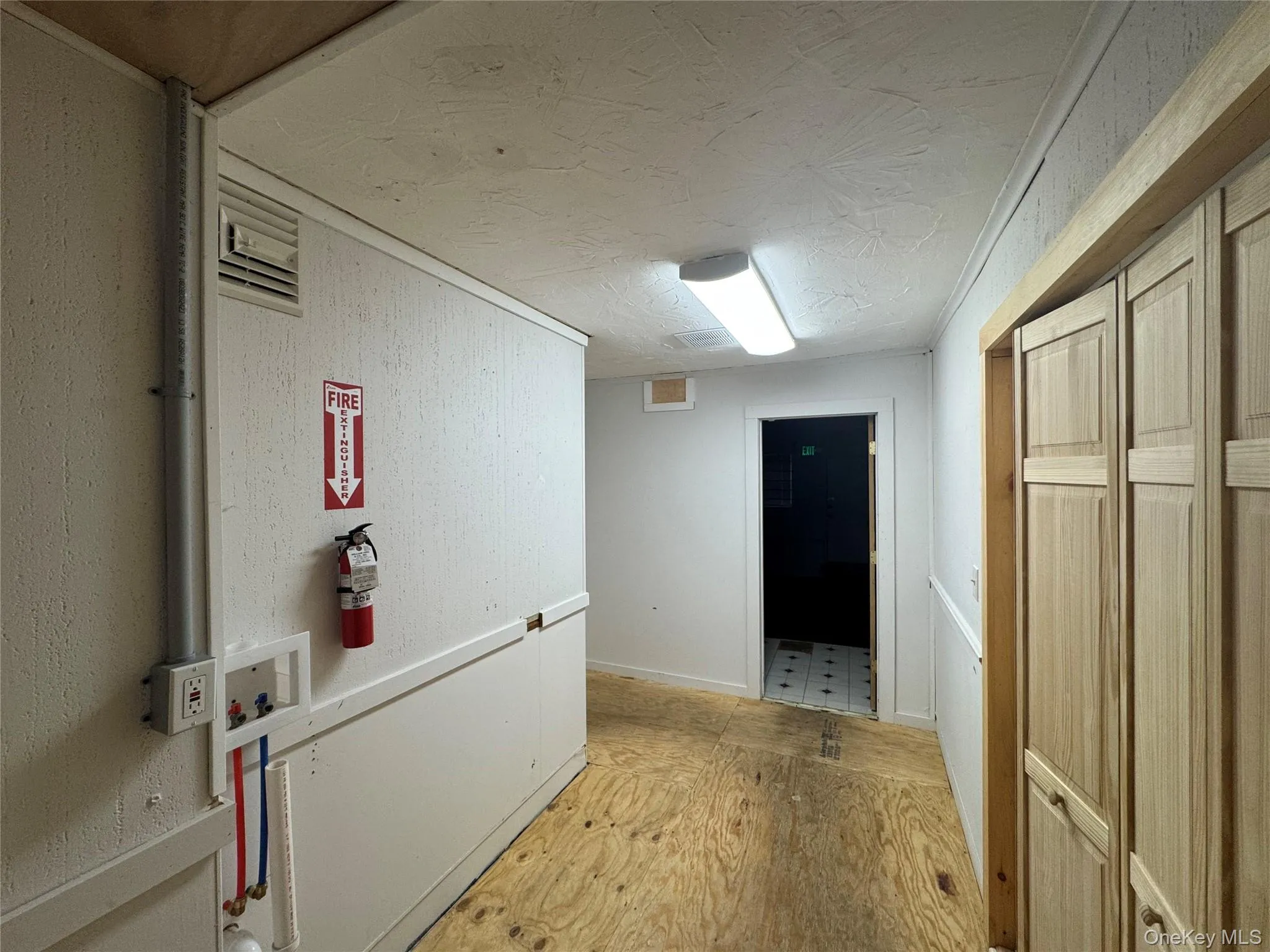 Hall with a textured ceiling Hall with a textured ceiling