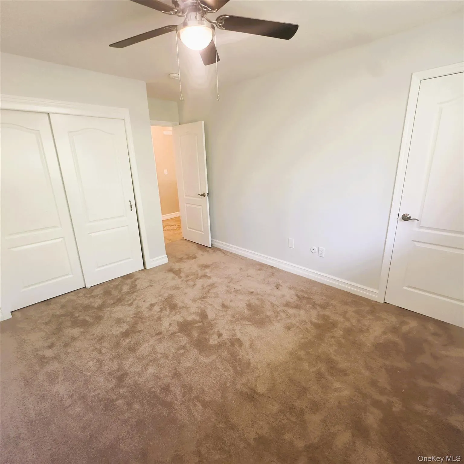 Second bedroom, one walk in closet, one regular closet Second bedroom, one walk in closet, one regular closet
