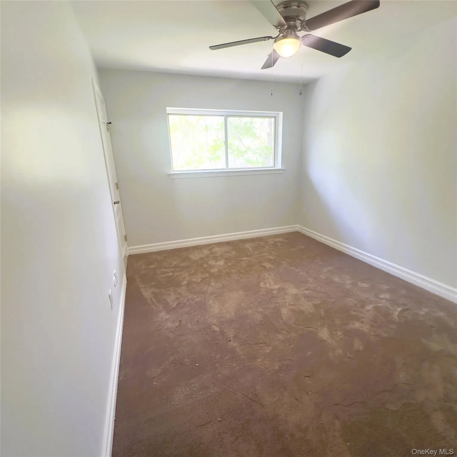 Second bedroom, new carpet ceiling fan with light. Second bedroom, new carpet ceiling fan with light.