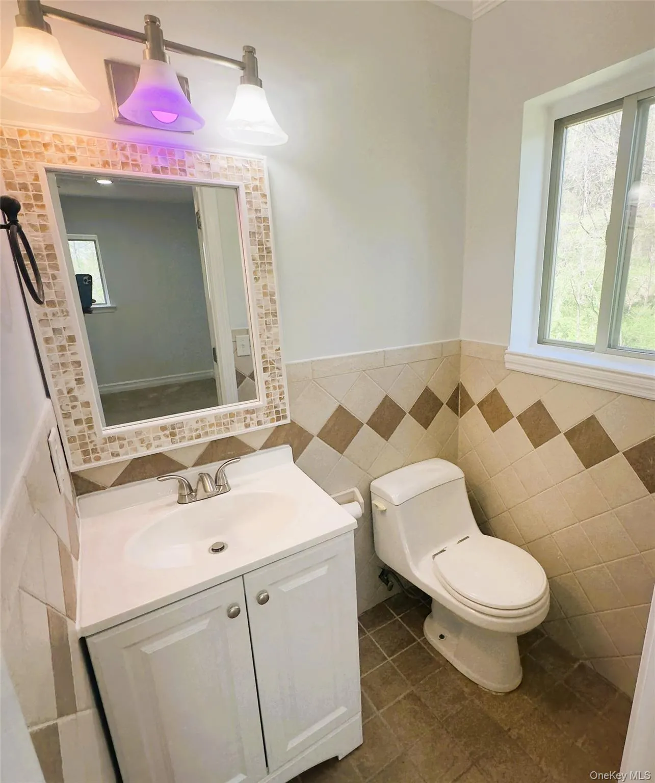 Half bathroom, ceramic floor, and walls, new vanity and mirror Half bathroom, ceramic floor, and walls, new vanity and mirror