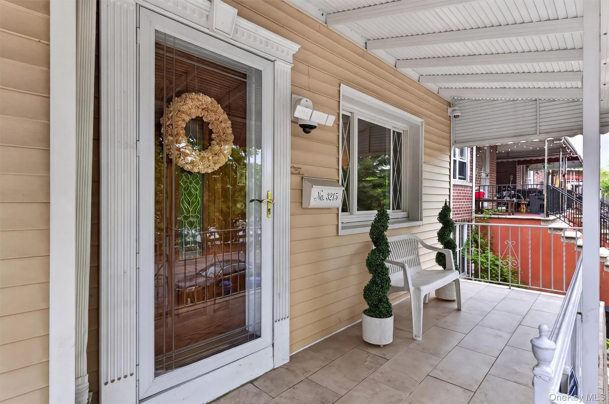 Front Entrance/Porch featuring Storm Door and crafted Wood and Glass Door Front Entrance/Porch featuring Storm Door and crafted Wood and Glass Door