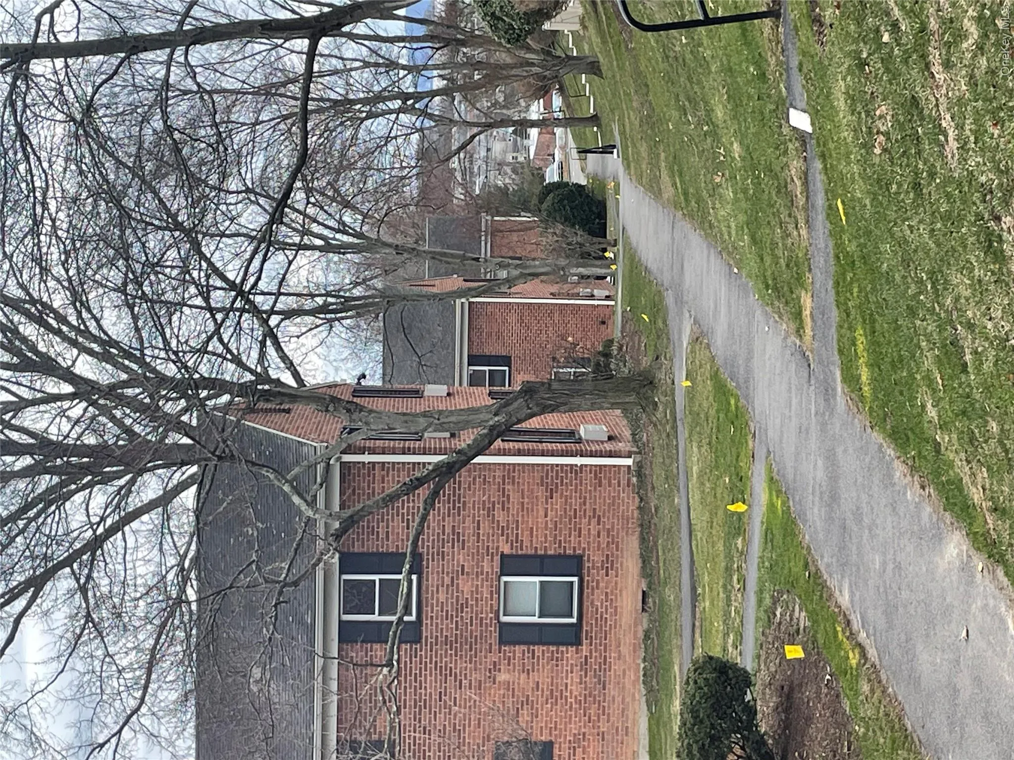 Unit B3 is the second brick building on the left. This walkway takes you to the parking lot & pool. Unit B3 is the second brick building on the left. This walkway takes you to the parking lot & pool.