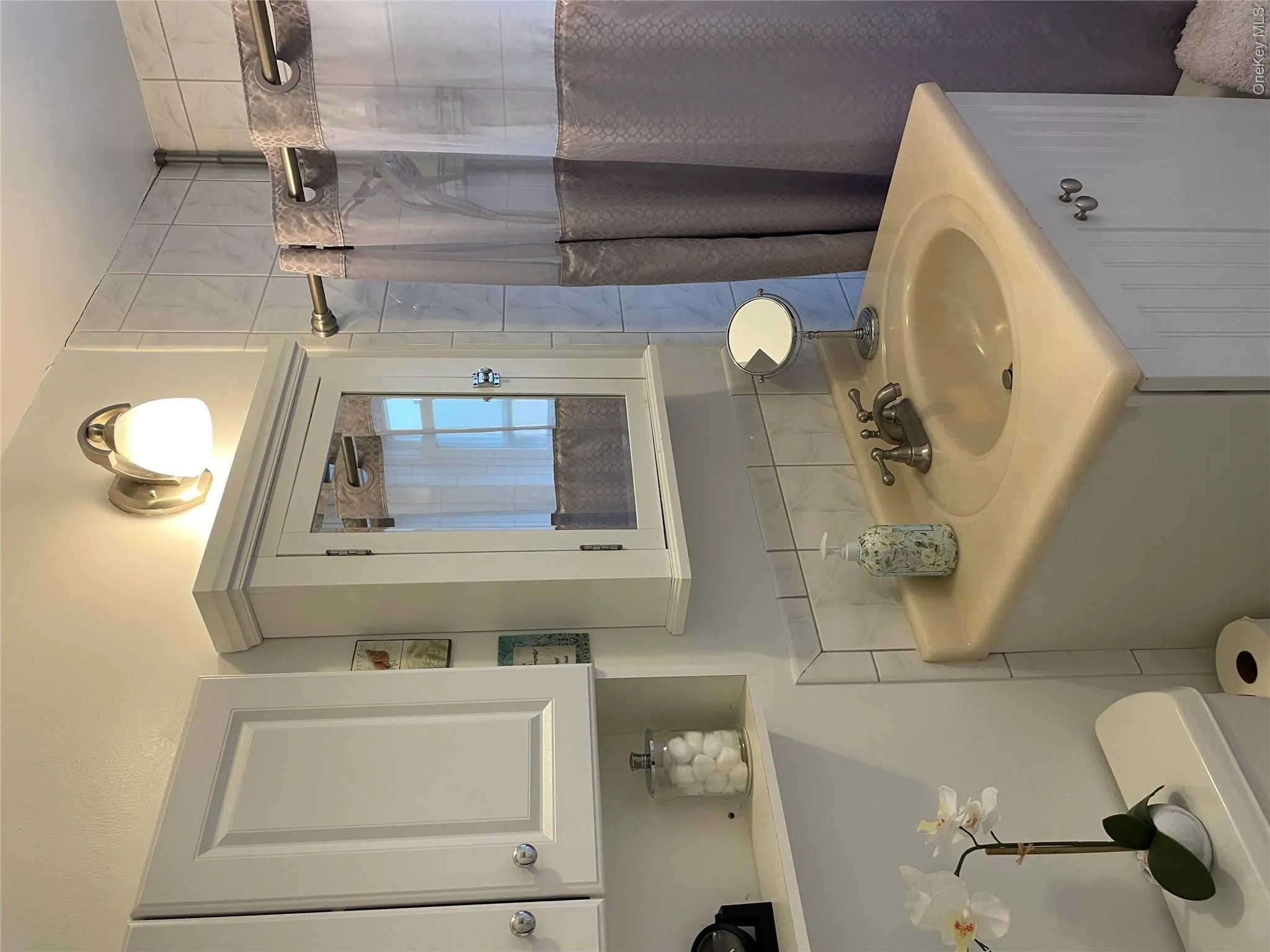 Easy to maintain white bathroom cabinets. Easy to maintain white bathroom cabinets.