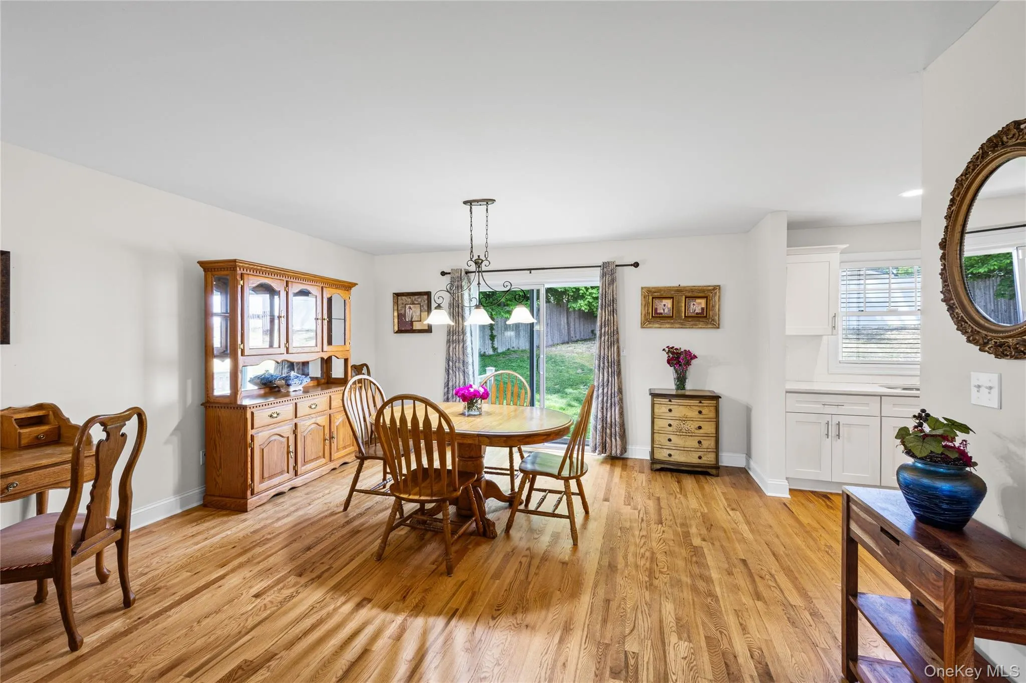 Handsome hardwood flooring throughout the main level. Handsome hardwood flooring throughout the main level.