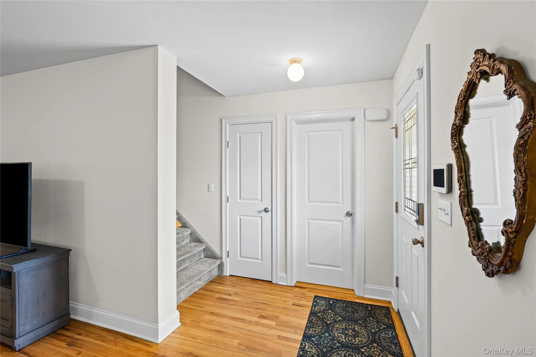 Entrance foyer opens to spacious and inviting living room. Entrance foyer opens to spacious and inviting living room.