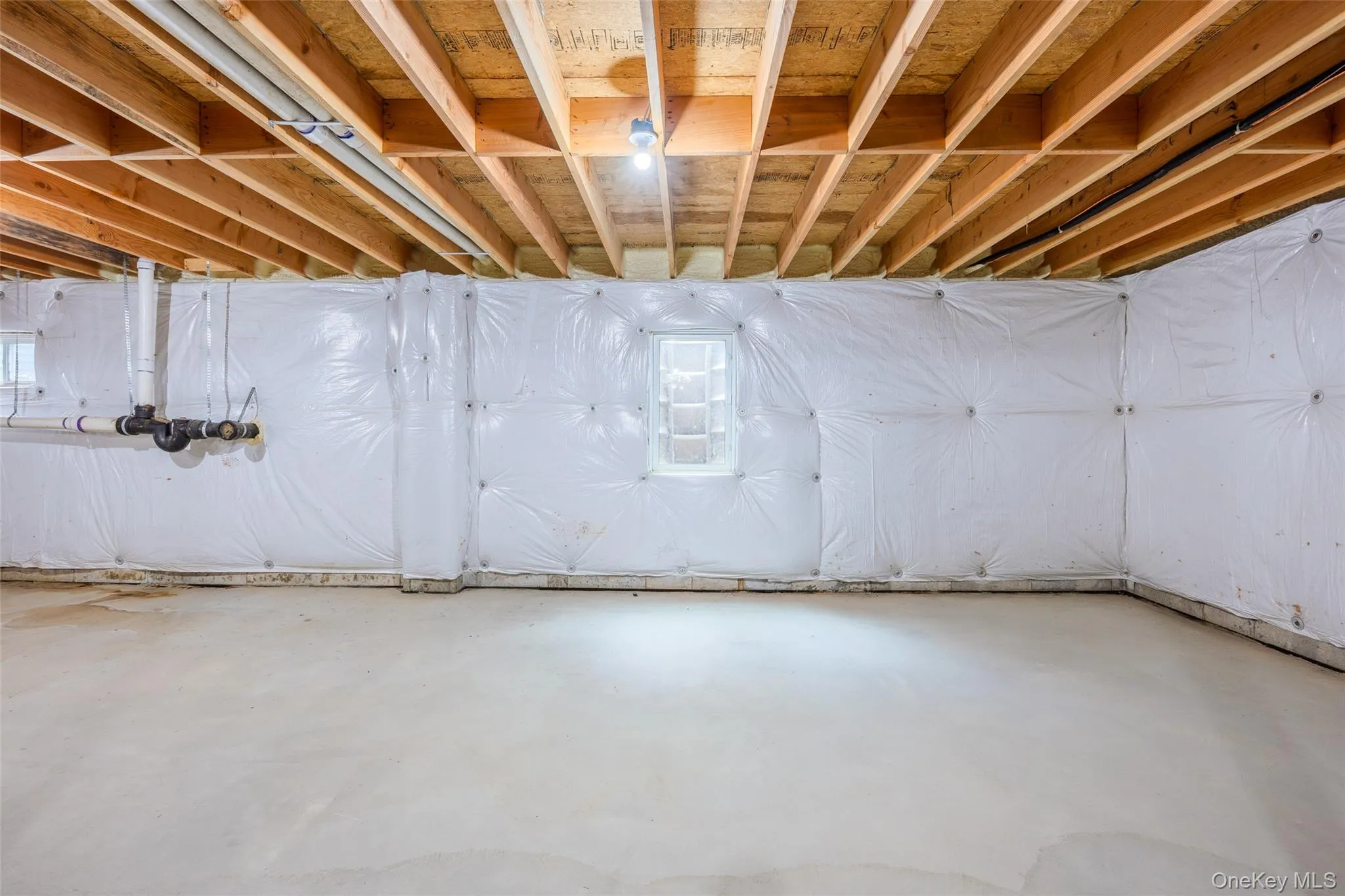 Expansive unfinished basement w/tall ceilings- open to every possibility! Expansive unfinished basement w/tall ceilings- open to every possibility!