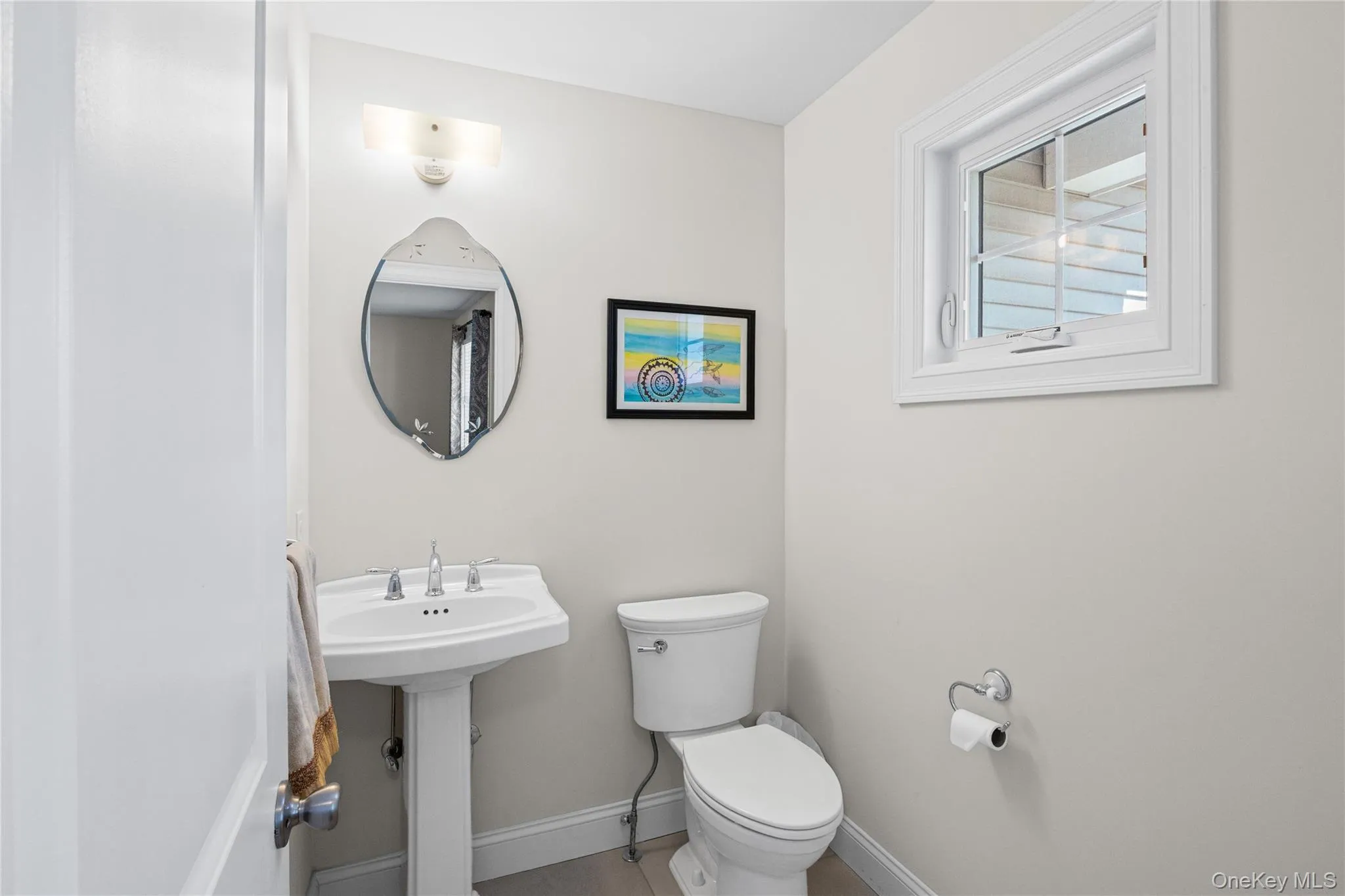 Convenient Powder Room situated by the entrance foyer. Convenient Powder Room situated by the entrance foyer.