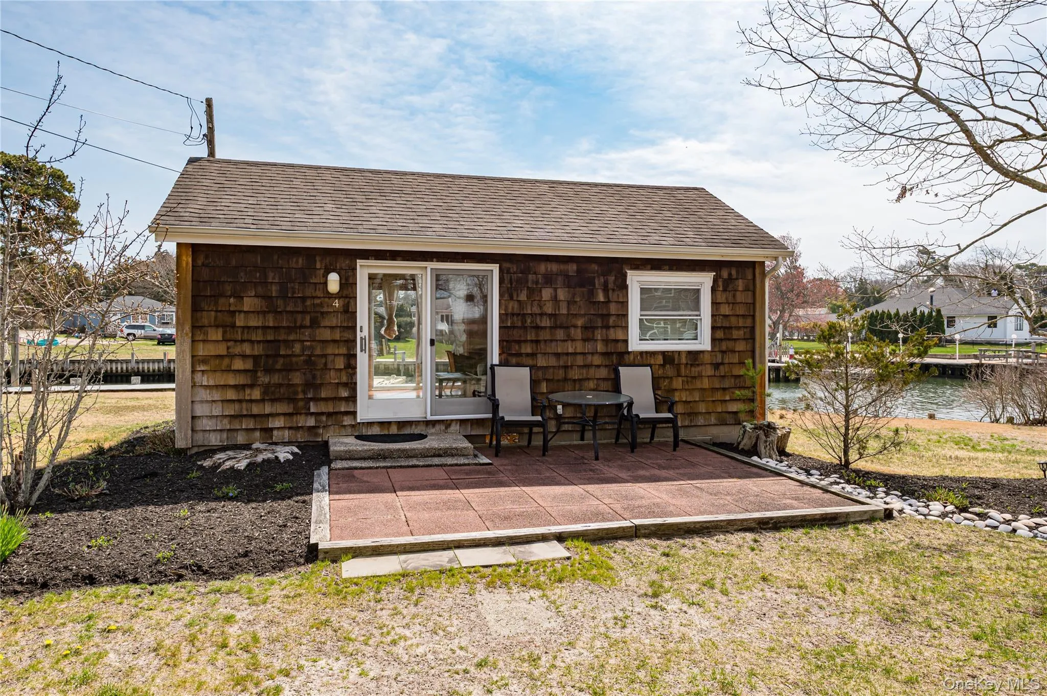 Entrance into cottage with patio Entrance into cottage with patio