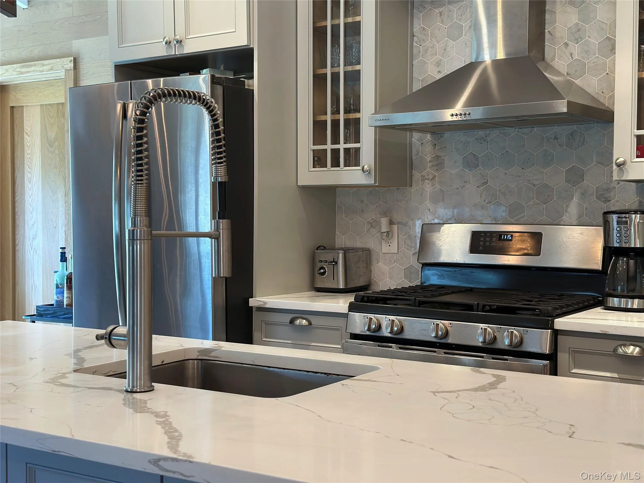 Kitchen with Kitchen Peninsula and Modern updated stainless appliances Kitchen with Kitchen Peninsula and Modern updated stainless appliances