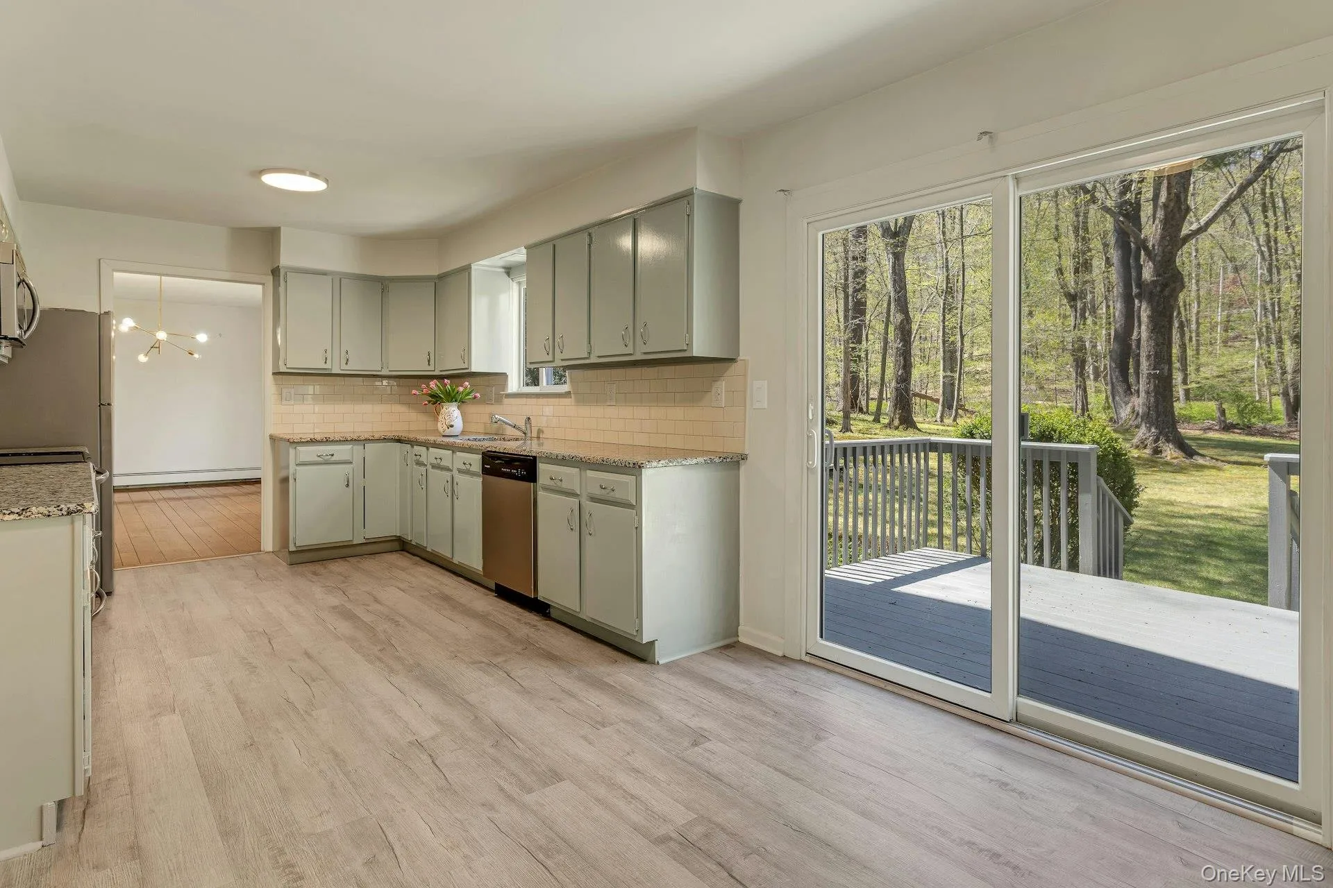 Kitchen Shows Table Area & Door to Deck Kitchen Shows Table Area & Door to Deck
