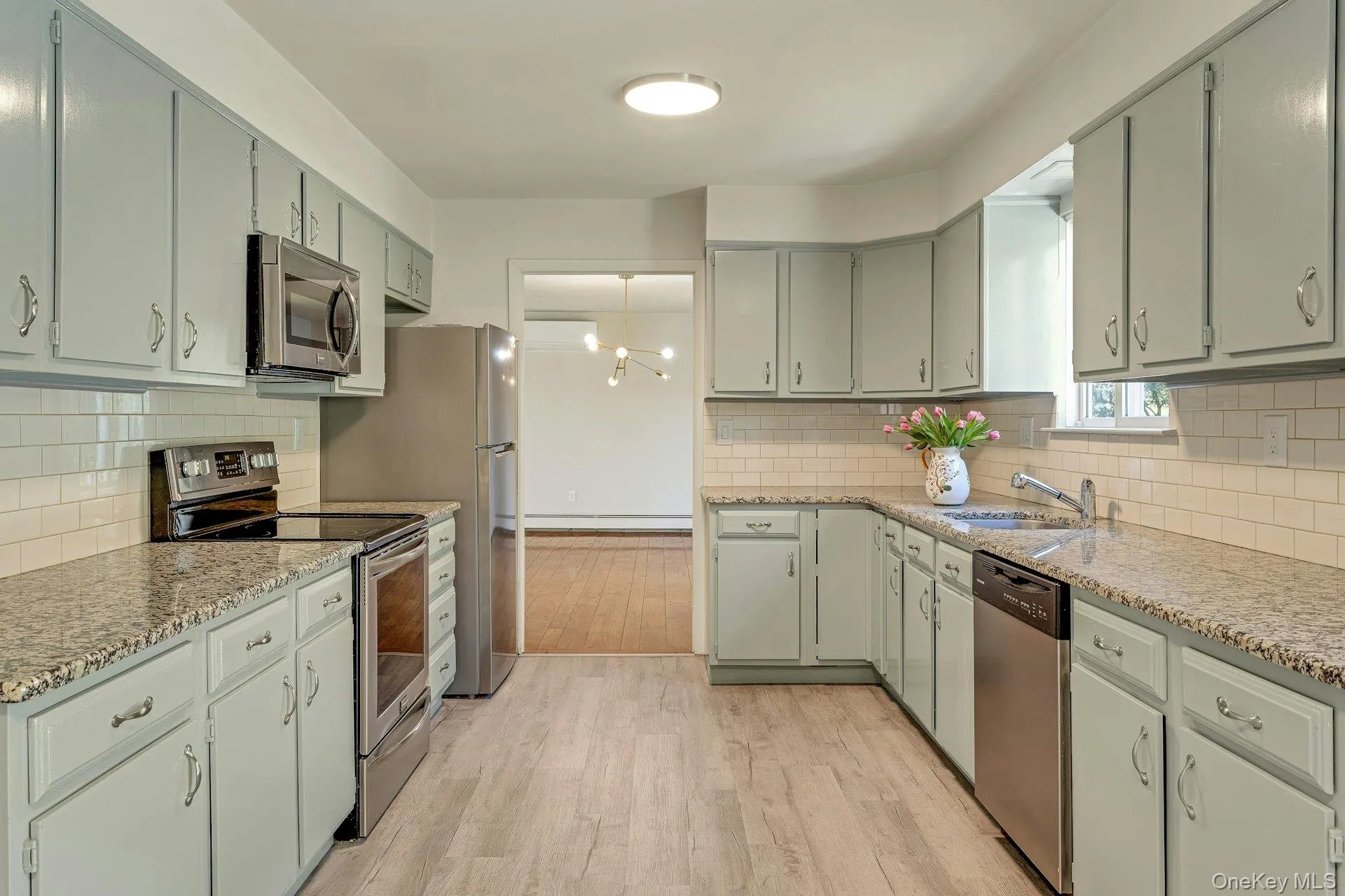 Kitchen Shows out to Great Room w/Dining Area Kitchen Shows out to Great Room w/Dining Area