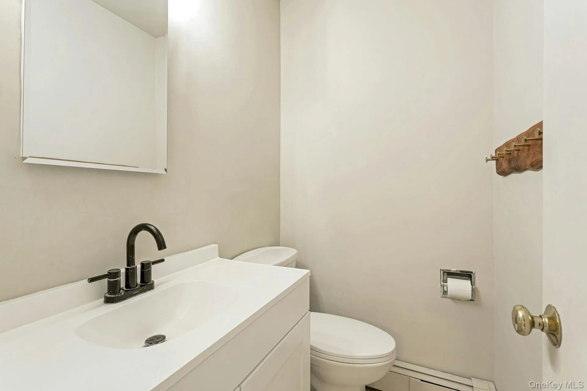 Powder Room on 1st Level Powder Room on 1st Level