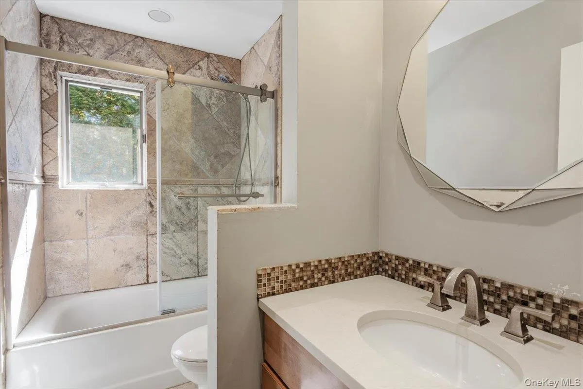 Full hall bathroom. There are three full bathrooms in the home. Full hall bathroom. There are three full bathrooms in the home.
