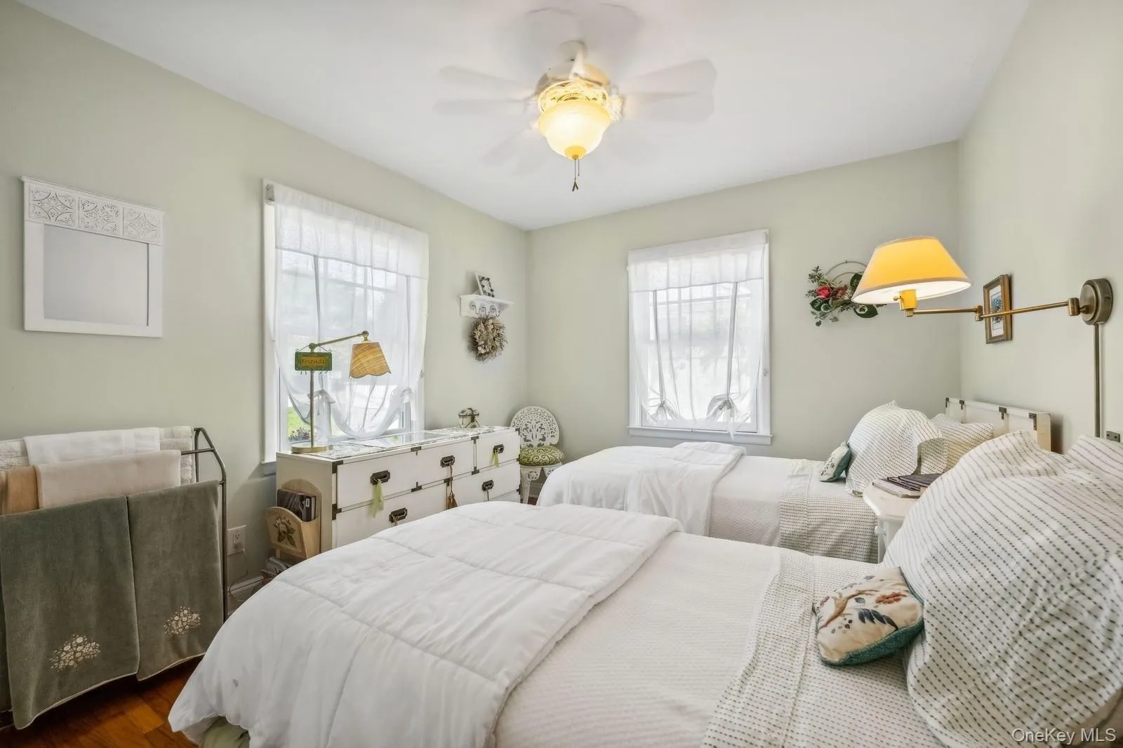 Bedroom 2 with hardwood floor, large closet, and ceiling fan Bedroom 2 with hardwood floor, large closet, and ceiling fan
