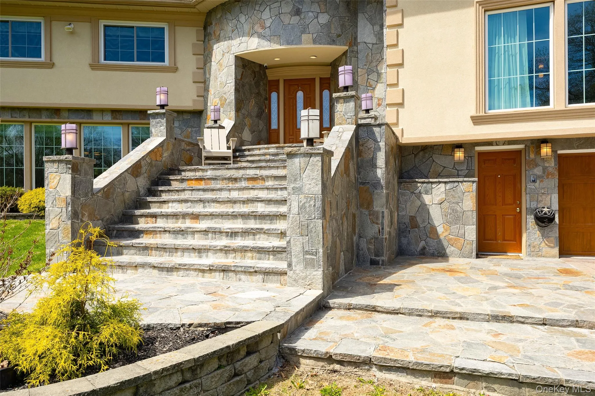 Front staircase and garage Front staircase and garage