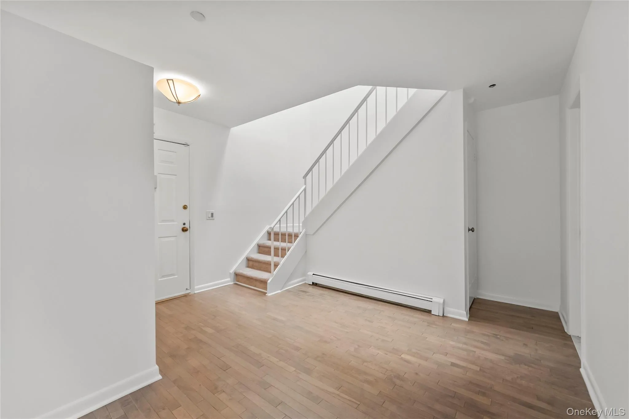 Entry into the unit, wood Floors Entry into the unit, wood Floors