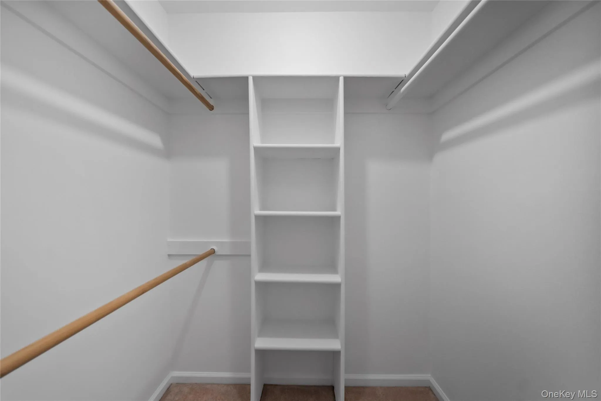 One of three closets in Primary Bedroom One of three closets in Primary Bedroom