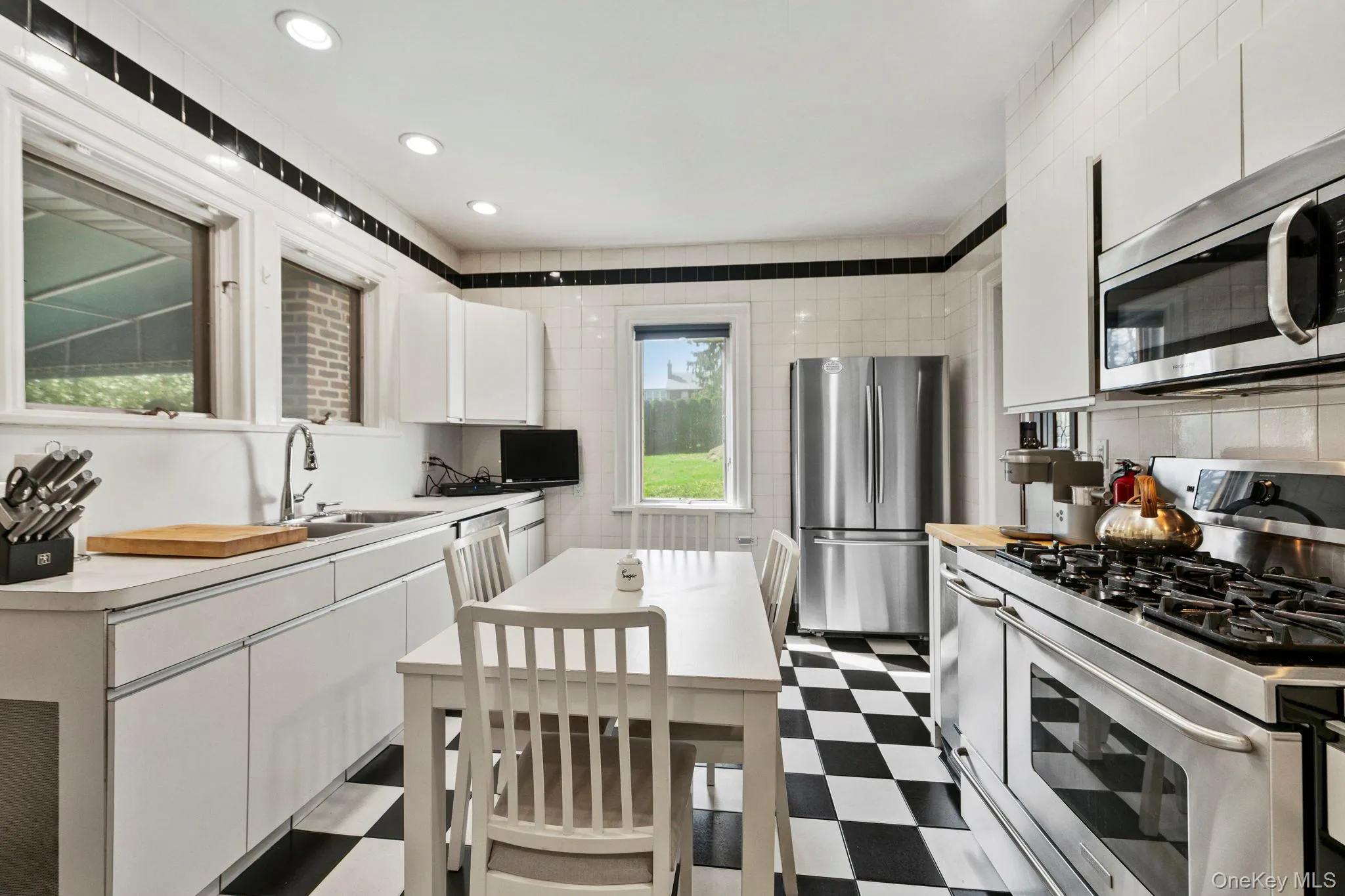 Eat-in Kitchen with stainless steel appliances Eat-in Kitchen with stainless steel appliances