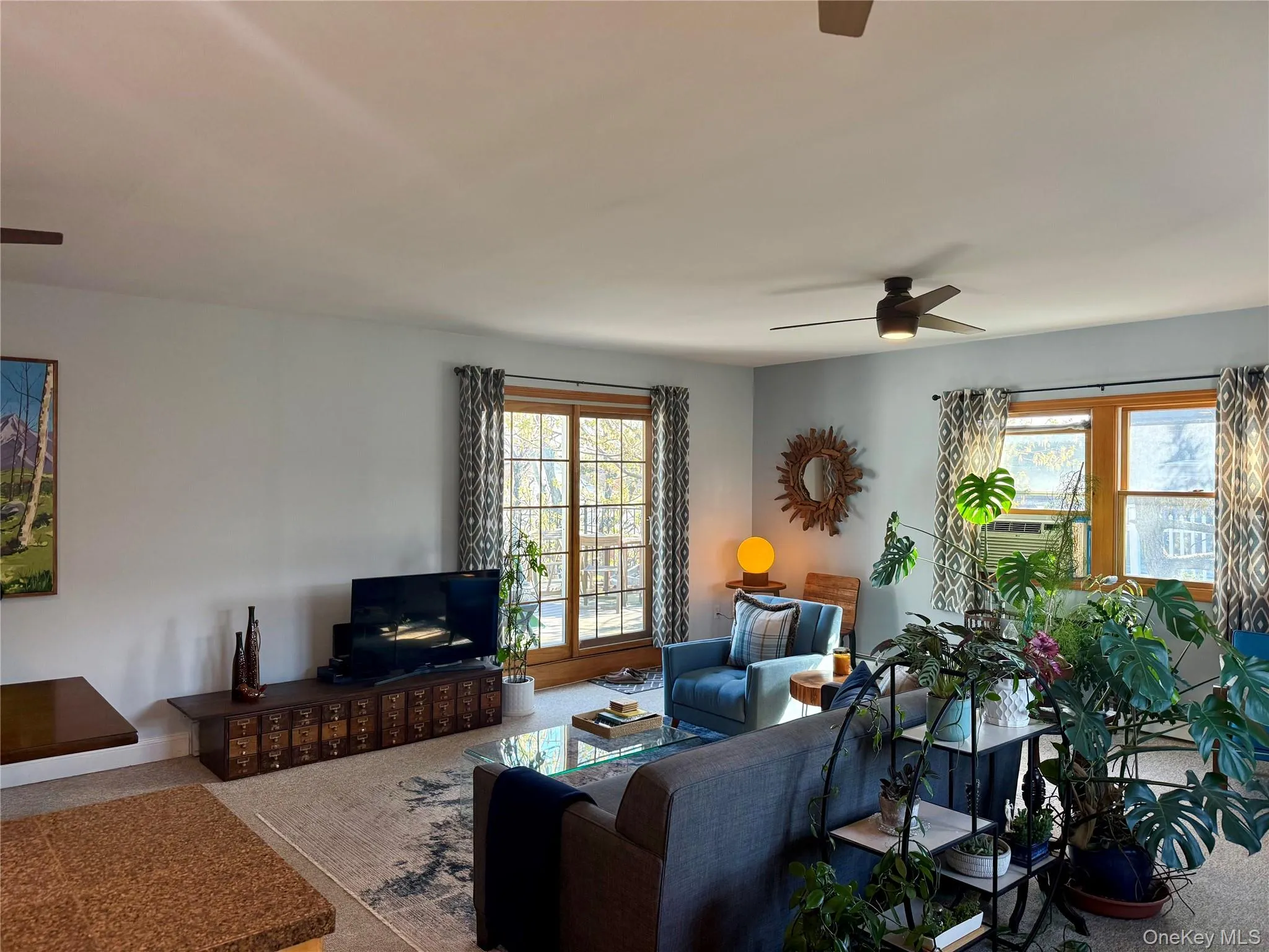 Open Living Room with sliders to Deck Open Living Room with sliders to Deck