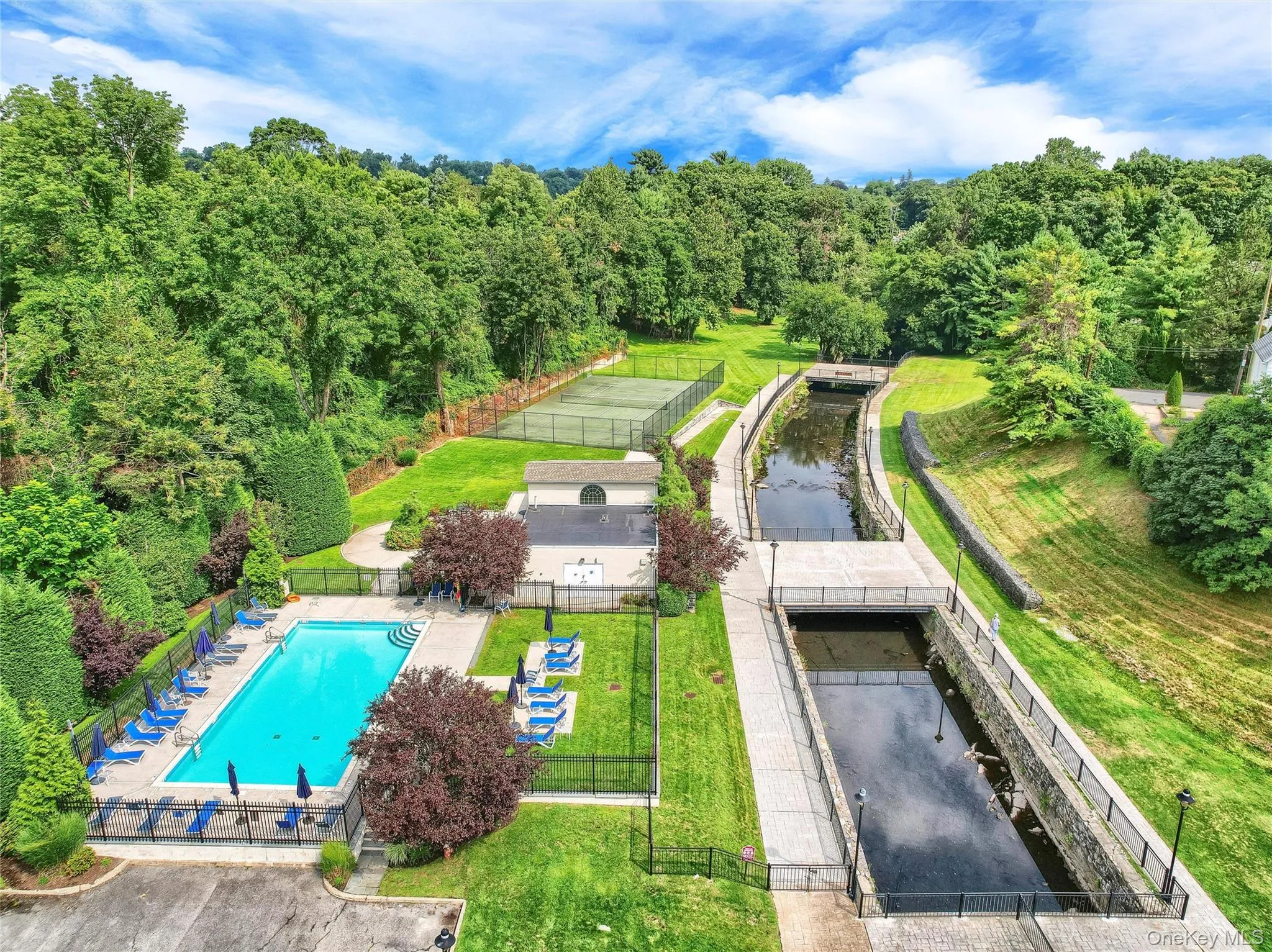 Beautiful grounds include tennis court and pool Beautiful grounds include tennis court and pool