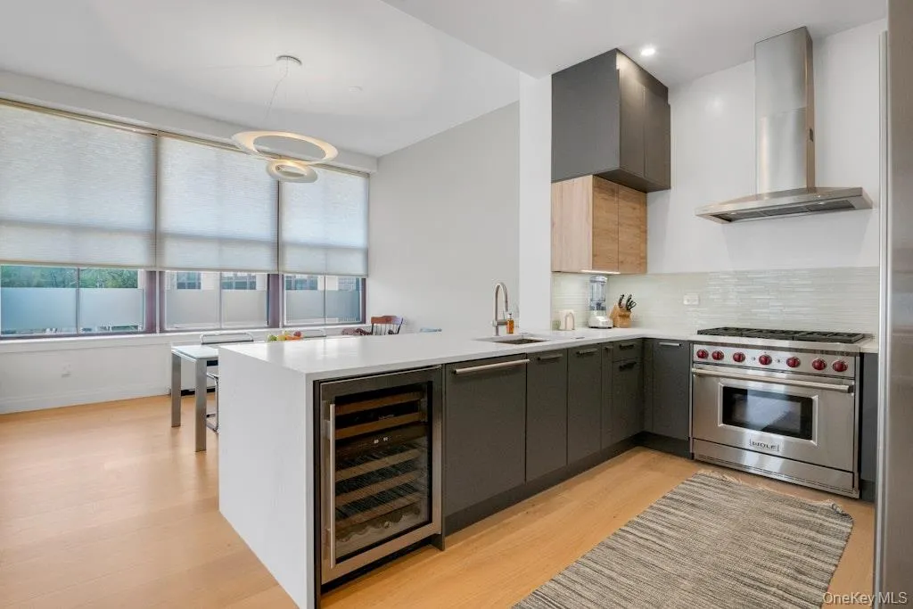 Renovated and expanded kitchen includes 6-burner Wolf range and Subzero Wine Fridge Renovated and expanded kitchen includes 6-burner Wolf range and Subzero Wine Fridge