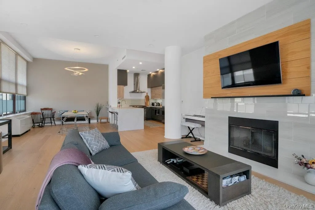 Beautiful gas fireplace surrounded by Caesarstone and complemented by a handsome tv mount Beautiful gas fireplace surrounded by Caesarstone and complemented by a handsome tv mount