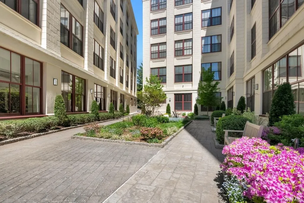 Enjoy relaxing in serene floral courtyard Enjoy relaxing in serene floral courtyard