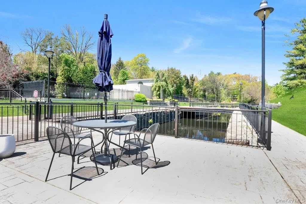Rivervue's patio and ground beyond Rivervue's patio and ground beyond