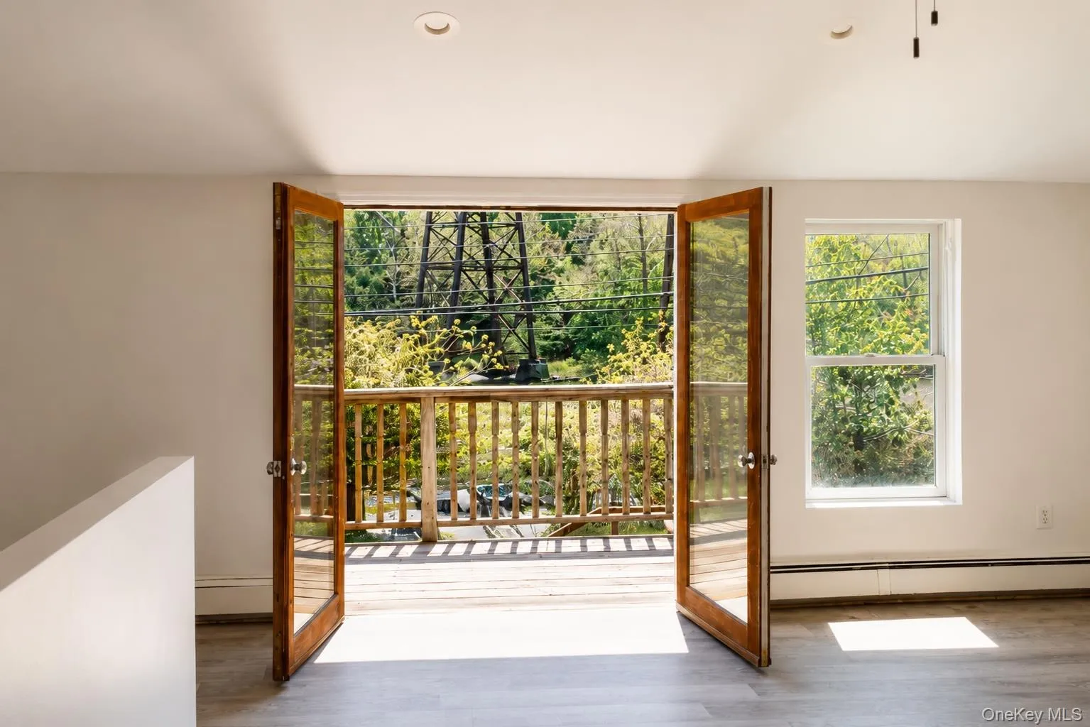 French doors to upstairs deck with view of Roundout. French doors to upstairs deck with view of Roundout.