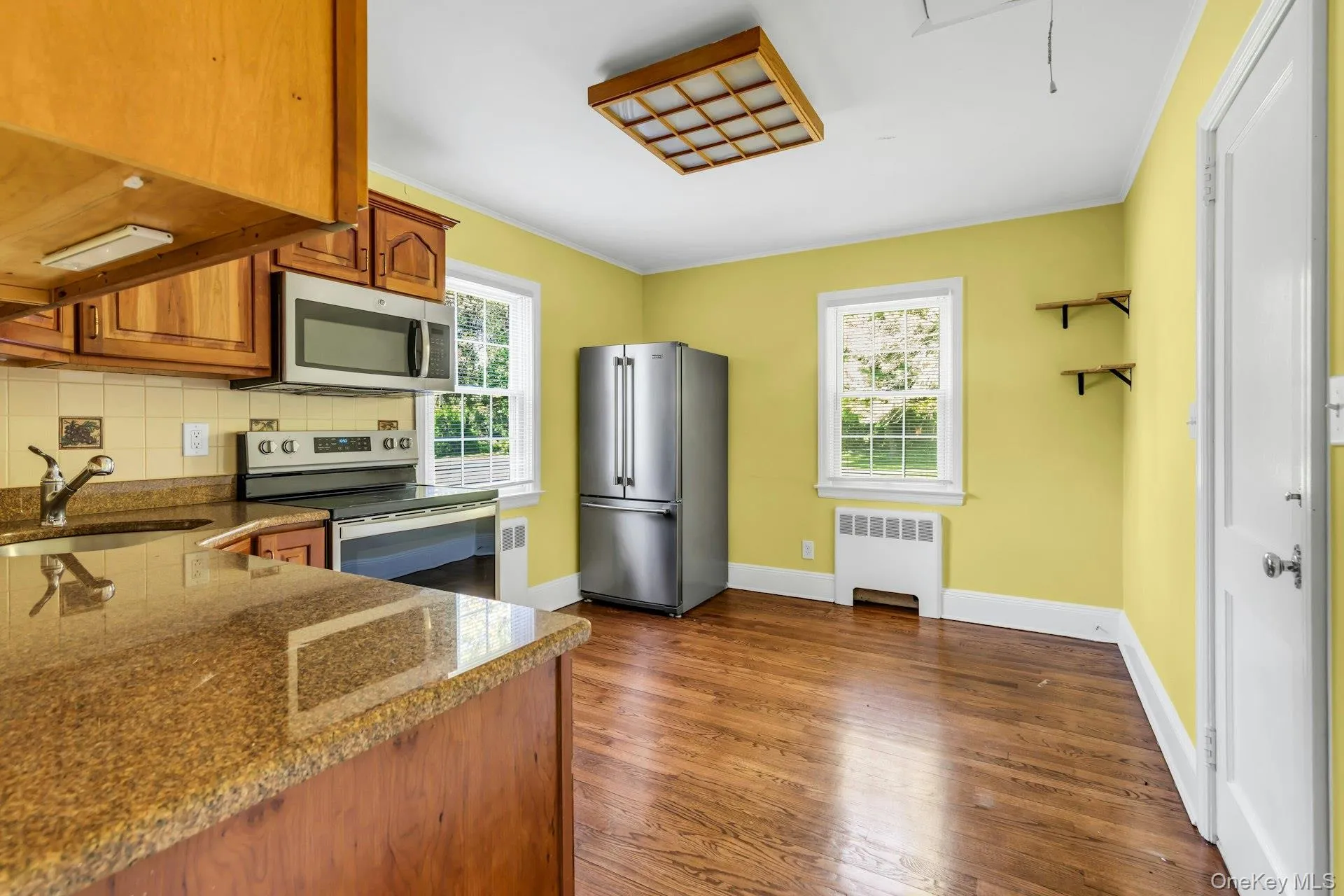 Eat in kitchen with hardwood floors. Eat in kitchen with hardwood floors.